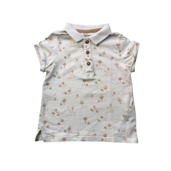 Polo beige avec motifs