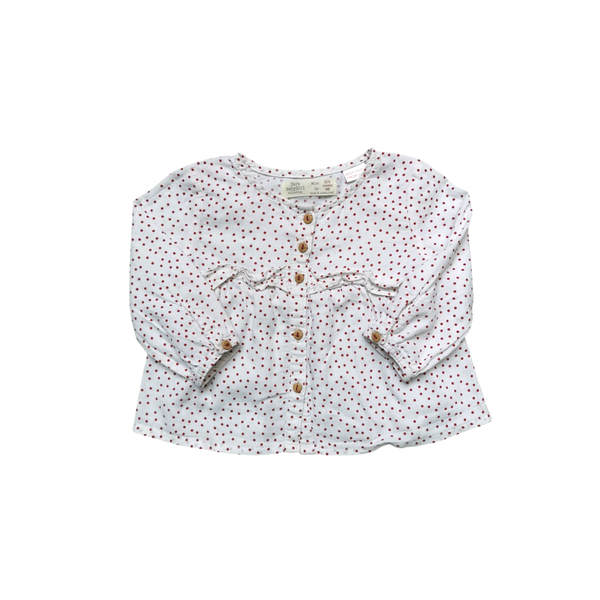Blouses blanches à pois rouge